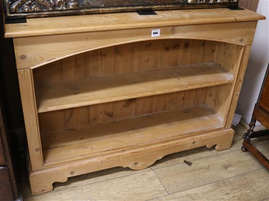 A pine open bookcase W.122cm